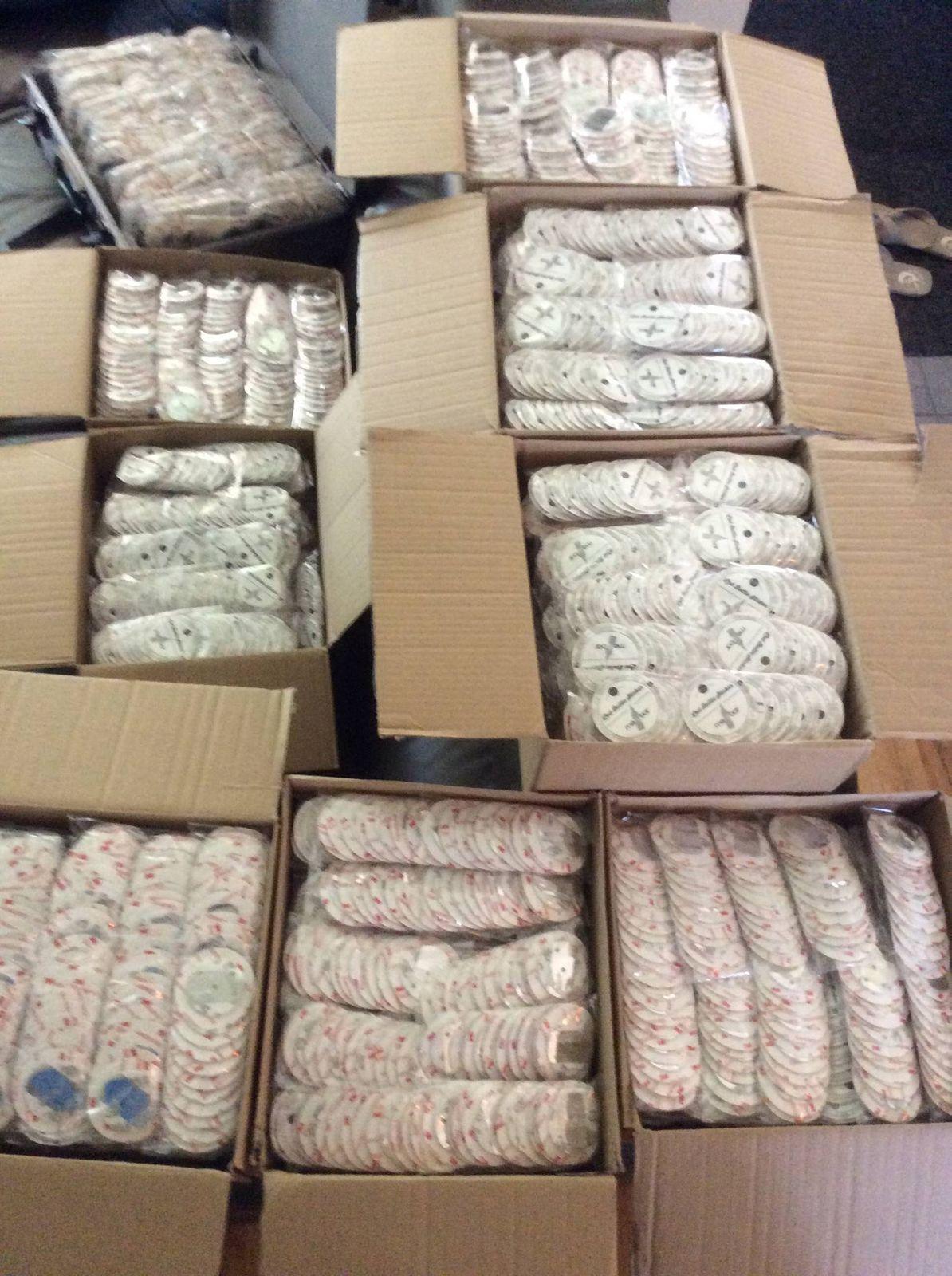 Boxes of LED bottle stickers ready to ship