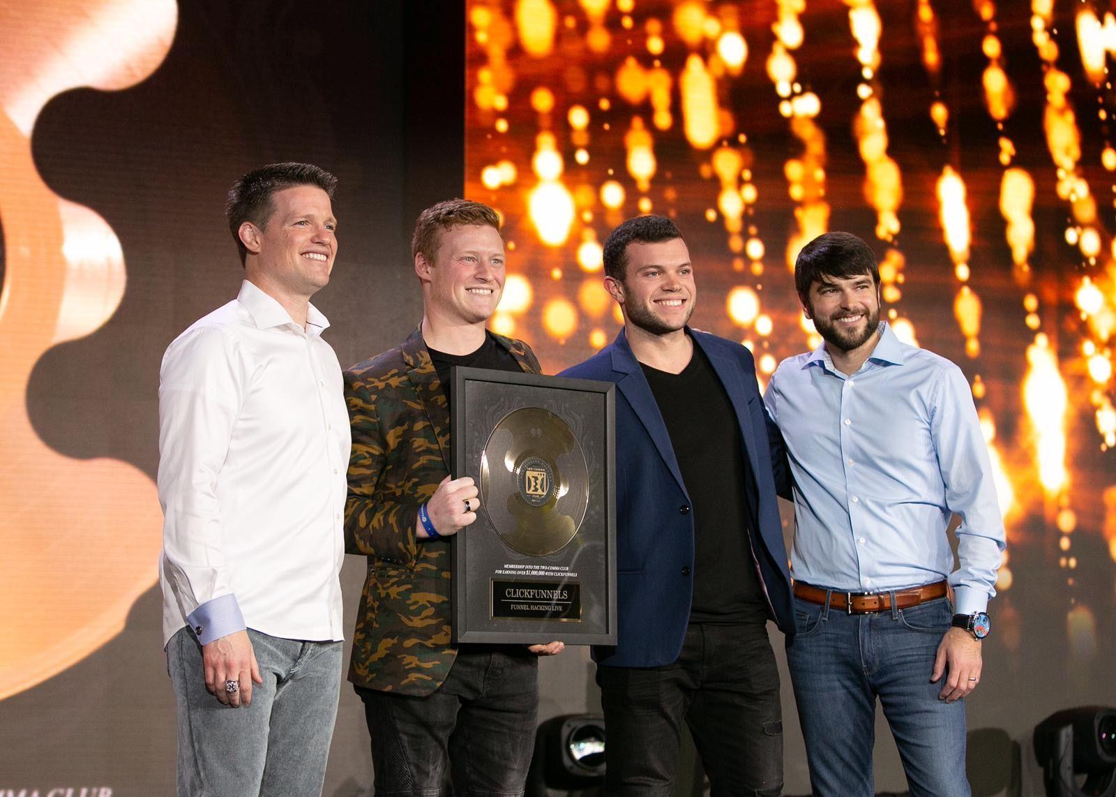 Receiving the ClickFunnels award for $6.9M in sales